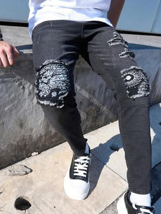 بنطال جينز أسود رفيع مطاطي برقع زخرفية ومسبوك بثقوب، بنطلون ضيق أنيق بقصة الوسط الممشوق