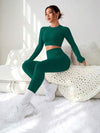 SHEIN Sport Studio طقم رياضي للنساء متكامل من بنطلون وبلوزة بأكمام طويلة، قطعتان من قماش مطاطي ذو لون واحد خالي من التفاصيل