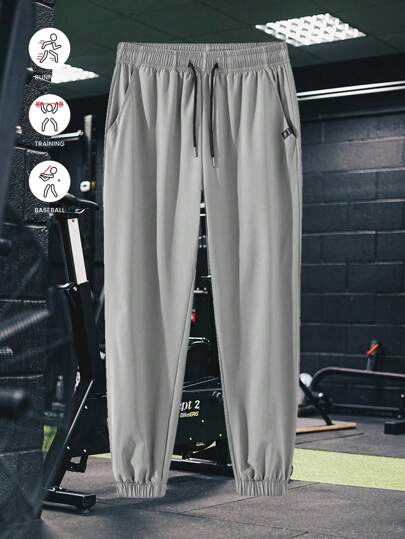 بنطلون رياضي للرجال مزود بأطراف مطاطية، قماش خفيف الوزن، قابل للتنفس، له قوام منسدل ومطاطي، تصميم يساعد في إنحسار وإطالة خطوط الساق، مناسب للرياضة، اللياقة البدنية، الركض، لعب الكرة، والأنشطة الترفيهية في الهواء الطلق