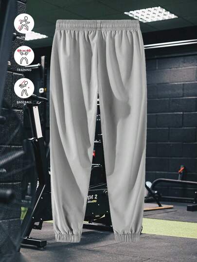 بنطلون رياضي للرجال مزود بأطراف مطاطية، قماش خفيف الوزن، قابل للتنفس، له قوام منسدل ومطاطي، تصميم يساعد في إنحسار وإطالة خطوط الساق، مناسب للرياضة، اللياقة البدنية، الركض، لعب الكرة، والأنشطة الترفيهية في الهواء الطلق