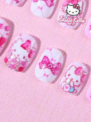 Sanrio ساعيو هيلو كيتي 24 قطعة أظافر فرنسية قصيرة مربعة. أظافر سهلة الوضع بتصميم ثلاثي الأبعاد لهيلو كيتي تناسب الأظافر تماما. مجموعة أظافر اصطناعية وملحقات تصميم أظافر لاستخدام البنات والأطفال في المناسبات العائلية، بطراز وردي