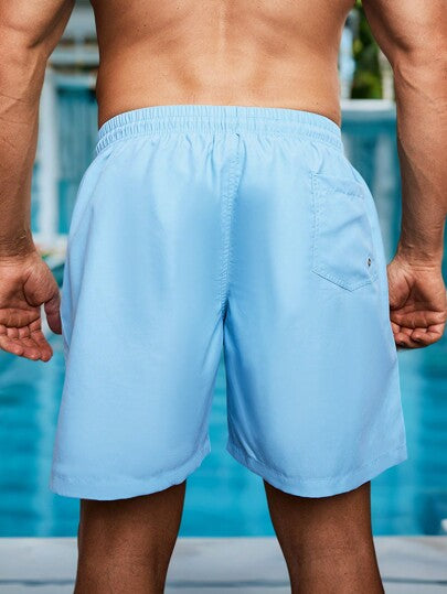 Manfinity Swimmode شورتات شاطئ للرجال ذات لون مصمت بجيب وسحاب (بطبعات عشوائية)