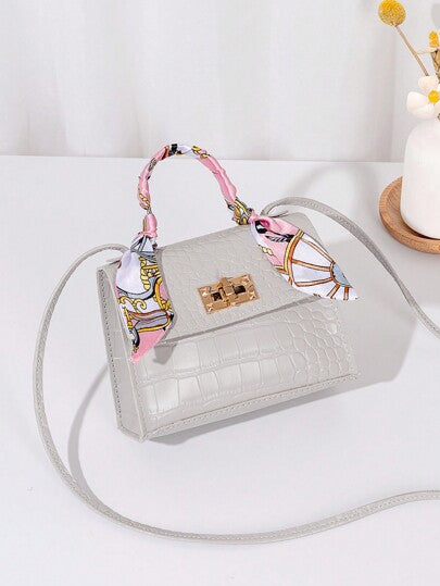 1 حقيبة صغيرة نسائية عبر الجسم بلون صلب مزينة بوشاح، للحمل باليد، مناسبة للاستخدام اليومي والهدايا