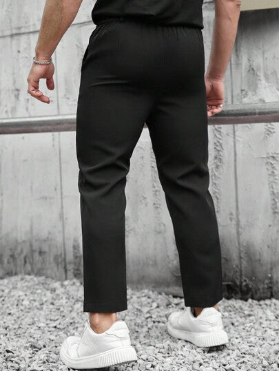 Manfinity Homme بنطلون بدلة كاجوال للرجال كبار الحجم بأزرار أمامية وربطة خصر وجيوب، ذو لون أحادي