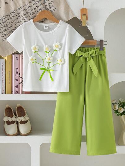 تيشيرتات بناتي مجموعة ملابس صيفية مريحة للبنات الصغيرات: بلوزة بياقة دائرية بأكمام قصيرة ومطبوعة بالأزهار باللون الأبيض وبنطلون أخضر بخصر رباط وساق مستقيم، 2 قطعة