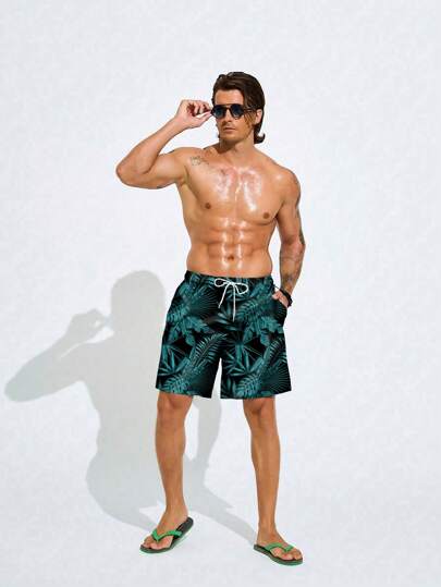 Manfinity شورت كاجوال بتصميم ربطة عنق مطبوع بالكامل مناسب للشاطئ، عطلة، هاواي