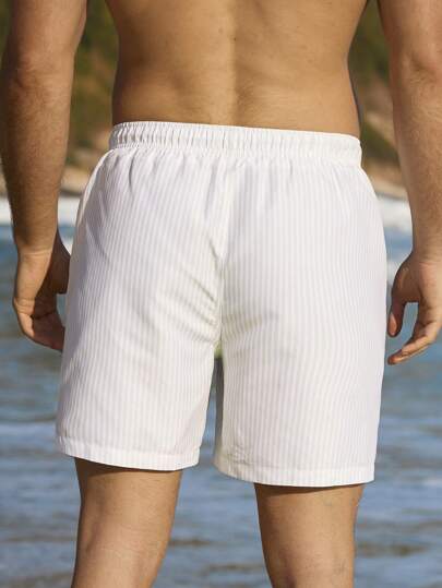 Manfinity Swimmode شورتات بحر عصرية بسيطة للرجال للارتداء اليومي