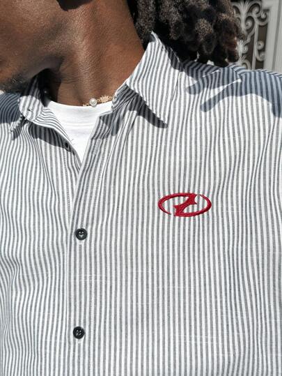 AXEPEAK قميص كاجوال رجالي بياقة طويلة بتصميم فضفاض ، رايات الكلية