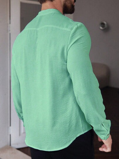 Manfinity Homme قميص رجالي كاجوال طويل الأكمام بلون أحادي، تصميم بسيط وأنيق للارتداء اليومي