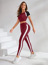 SHEIN Sport Studio مجموعة رياضية للنساء (ملابس علوية سوداء قصيرة الأكمام ذات رقبة مستديرة مع بنطال طويل) طقم رياضي للنساء