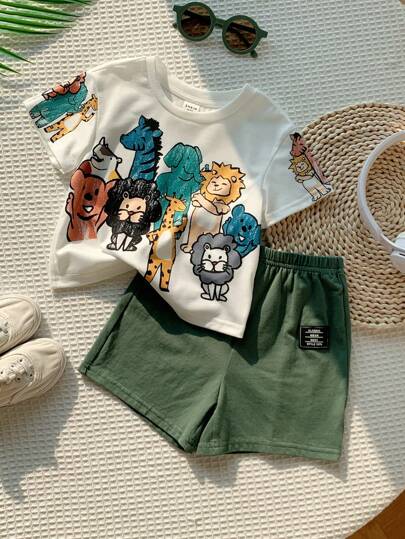 SHEIN مجموعة قطعتين للأولاد الرضع من ملابس علوية لصيفي كاجوال مطبوع برسوم الحيوانات المرسومة بالألوان ومرتخي، وشورت مافشكنج قطعتان مناسبة للارتداء في الربيع والصيف، للاستخدام الداخلي والخارجي