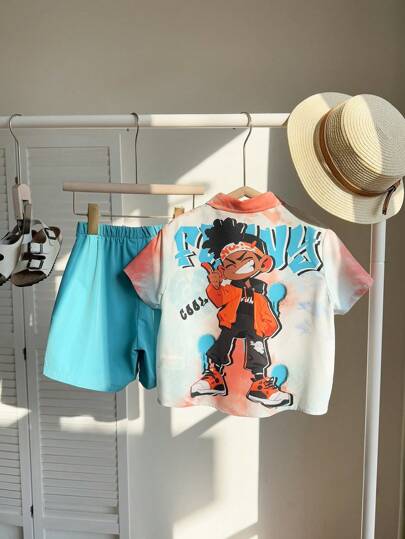 2 طقم ملابس أولاد كاجوال رياضي بطراز الكلية والشارع، ملابس ذات قصة فضفاضة مطبوعة بطراز الجرافيتي على قميص وشورت، مناسبة للحفلات والأعياد والمناسبات والمدرسة والسفر والرياضة، مناسبة للربيع والصيف