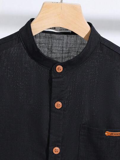 SHEIN قميص كاجوال فضفاض مريح بخطوط ملونة وأزرار للأولاد في سن المراهقة الصغار، بأكمام قصيرة