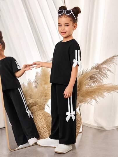 تيشيرتات بناتي مجموعة من قطعتين ، تيشيرت كريو نيك فضفاض محبوك باللون الواحد وبنطال ساق واسعة للشابات