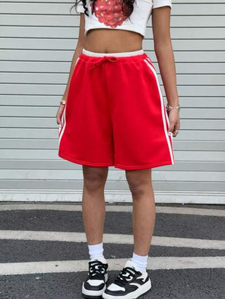 ملابس رياضية أطفال شورت رياضي فضفاض بطبعة كتلة اللون مع شريط الخصر، مناسب للعودة إلى المدرسة للمراهقات