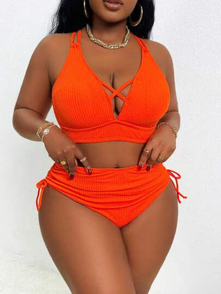 Slaydiva مجموعة بيكيني من قطعتين: العلوي بتصميم رقبة مربوطة متقاطعة مبطن، والسفلي بخصر عالي مجعد مع سحّاب للسحب. مناسب للحجم الكبير، أنيق وجذاب للاستخدام في الشاطئ والعطلات الصيفية