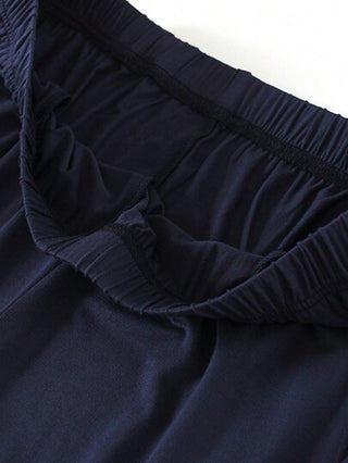 4 قطع مجموعة بيجامات رجالية مكونة من قميص نصف كم وشورت قصير ذات لون أحادي مع تريم بلون متضاد، طقم منزلي صيفي فضفاض وعصري