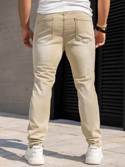 Manfinity Homme سراويل جينز للرجال بنقشة منعشة ومظهر محايد مضيق القدم