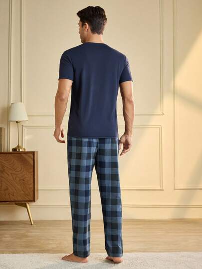 Manfinity Underwear&Sleepwear Basics مجموعة بيجامة (2 قطعة) للرجال بسروال مربع وقميص كم قصير أحادي اللون، ملابس منزلية