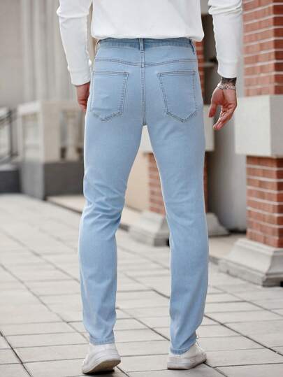 Manfinity Homme بنطلون جينز كاجوال رجالي ضيق مخصر باللون الأزرق مع جيوب