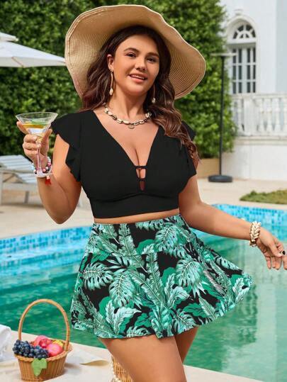 Swim Lushoire مجموعة من قطعتين للمرأة متزايدة الحجم تتضمن: ملابس علوية برقبة متكشرفة وتنورة مطبوعة بطبعة استوائية تزيد من اناقتها، بدلة سباحة أنيقة ملائمة للاستخدام في الشاطئ والرحلات الصيفية