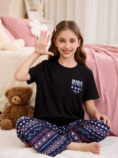 بيجاما بليزة بكم قصير برقبة مستديرة وجيوب مطبوعة بنقشة الزهور الفينتاج والبنطال السائب قطعتان مجموعة بيجاما كاجوال مناسبة للبنات المراهقات