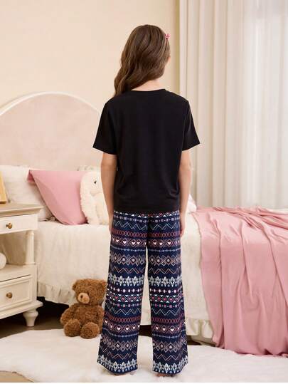 بيجاما بليزة بكم قصير برقبة مستديرة وجيوب مطبوعة بنقشة الزهور الفينتاج والبنطال السائب قطعتان مجموعة بيجاما كاجوال مناسبة للبنات المراهقات