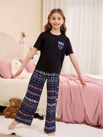 بيجاما بليزة بكم قصير برقبة مستديرة وجيوب مطبوعة بنقشة الزهور الفينتاج والبنطال السائب قطعتان مجموعة بيجاما كاجوال مناسبة للبنات المراهقات