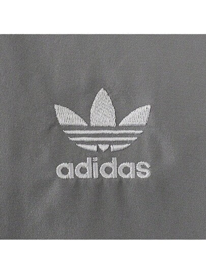 Adidas Originals جاكيت أنثوي كبير الحجم موديل TT ، خارجي مزود بقلنسوة منسوجة JD3394