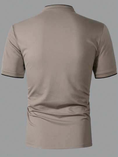 Manfinity Homme قميص بولو أكمام قصيرة لون أحادي للرجال، كاجوال وأنيق للارتداء اليومي