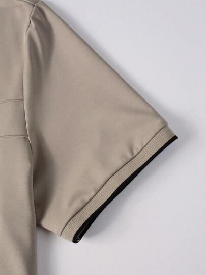 Manfinity Homme قميص بولو أكمام قصيرة لون أحادي للرجال، كاجوال وأنيق للارتداء اليومي