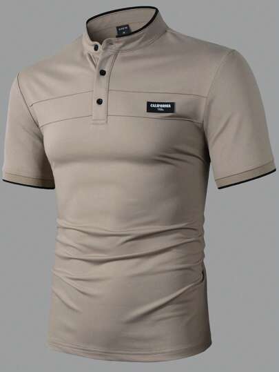 Manfinity Homme قميص بولو أكمام قصيرة لون أحادي للرجال، كاجوال وأنيق للارتداء اليومي