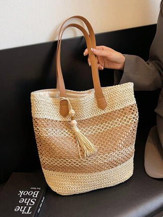 حقيبة يد من القش المنسوج للنساء موسم الربيع والصيف ، حقيبة شاطئ مفرغة بشراشيب ذات سعة كبيرة ، مناسبة للسفر الأنيق والاستخدام اليومي