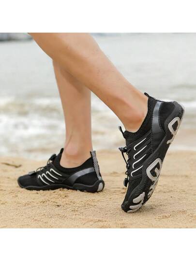 بوت رجالية للإستخدام الخارجي مقاومة للانزلاق من المطاط الأسود بتصميم شبكي مع نظام ربط الحذاء