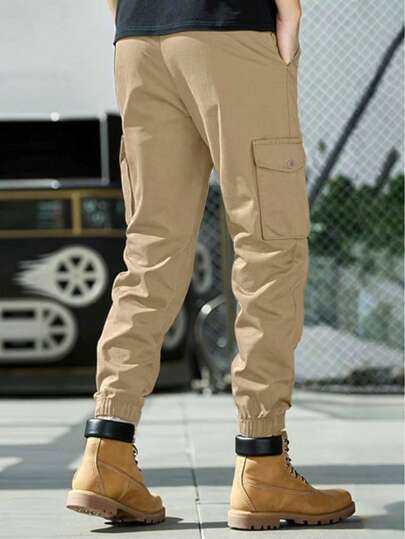 Manfinity Homme بنطلون كاجوال ضيق الحيازة بجيوب من النسيج الاساسي للرجال