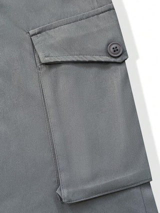 Manfinity Homme بنطلون كاجوال رجالي ذو لون سادة، قصة ضيقة، مزود بأربطة للكاحل و جيوب للبضائع