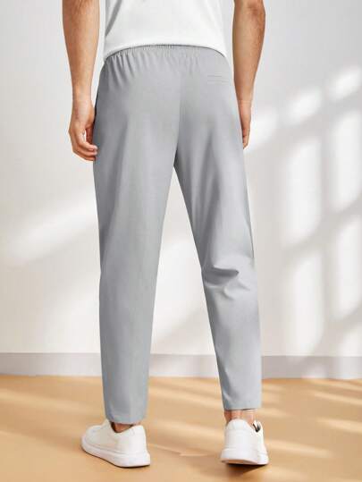 Manfinity ModaGents بنطلونات كاجوال بجيوب مبطن بحبل سحاب مناسب للمناسبات الرسمية مقاس ضيق ، مصنوع من قماش منسوج