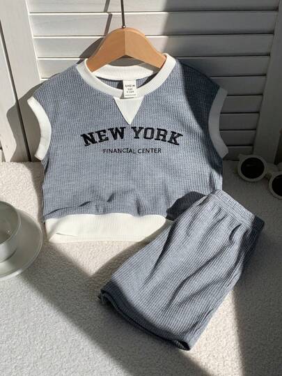 SHEIN مجموعة من قطعتين للأطفال البنات/البنين، ملابس علوية كروز واسعة فضفاضة محبوكة وشورت مناسبة للاستخدام اليومي العادي، مناسبة للربيع/الصيف للارتداء الداخلي والخارجي