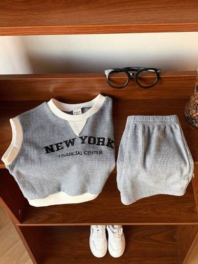 SHEIN مجموعة من قطعتين للأطفال البنات/البنين، ملابس علوية كروز واسعة فضفاضة محبوكة وشورت مناسبة للاستخدام اليومي العادي، مناسبة للربيع/الصيف للارتداء الداخلي والخارجي