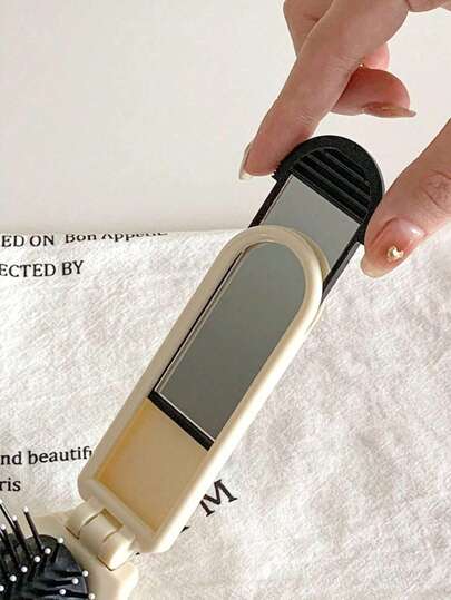 قطعة واحدة من المشط القابل للطي المطلي بالفضة مع مرآة، فرشاة شعر صغيرة محمولة وقابلة للطي بوسادة هوائية، مشط هوائي قابل للطي مدمج مع مرآة خاص للسيدات