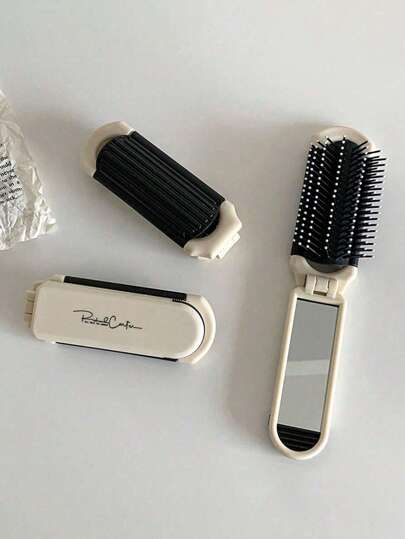 قطعة واحدة من المشط القابل للطي المطلي بالفضة مع مرآة، فرشاة شعر صغيرة محمولة وقابلة للطي بوسادة هوائية، مشط هوائي قابل للطي مدمج مع مرآة خاص للسيدات