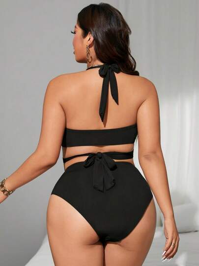 Swim SXY بدلة السباحة قطعة واحدة من قماش ذو لون أحادي، واسع الحجم وملائم للخصر، بنقشة مفرغة وحمالات رفيعة ظهر عاري، مناسبة لفصل الصيف والشاطئ