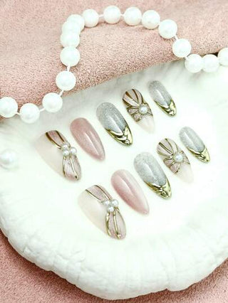 10 قطعة، أظافر تركيب مباشر، أظافر أرجواني وزهري بطبعة المرآة السحرية والتدرج الزهري، مرصعة باللؤلؤ، أنيقة ومنيرة، بأسلوب هادئ. هذا مجموعة المناكير تحتوي على جيلي جل واحد وملف أظافر صغير، بالإضافة إلى مجموعة من الأظافر الجميلة المصنوعة يدويًا للتركيب...