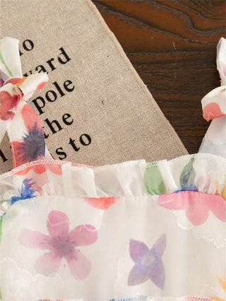 فساتين بيبي فستان صيفي بناتي ناعم خفيف الوزن مع طباعة وديكور زهري وفيونكة ملونة بلا أكمام