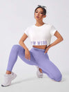SHEIN Sport Studio مجموعة رياضية للنساء 3 قطع طقم رياضي مكون من: ملابس علوية كامي ظهر متقاطع مطبوع عليه رسوم، ملابس علوية كم قصير، وباطار خصر عالي للربط للياقة البدنية
