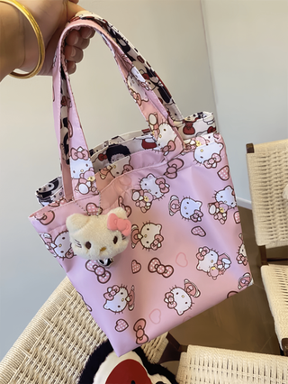 Sanrio حقيبة كتف كانفاس للنساء بتصميم كارتوني لطيف لهيلو كيتي، بسوستة، حقيبة تخزين متعددة الوظائف عالية الجودة، حقيبة ظهر مدرسية، حقيبة خارجية، حقيبة زخرفية، حقيبة تسوق، هدية للنساء، هدية تخرج وعيد الأم