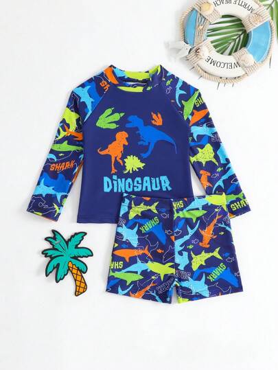 مايوه أولادي مجموعة ملابس سباحة للأولاد الرضع 2 قطعة، تي شيرت أكمام طويلة برقبة مقطعة بطبعة السمكة القرش وألوان متباينة مع شورت سباحة منفصل