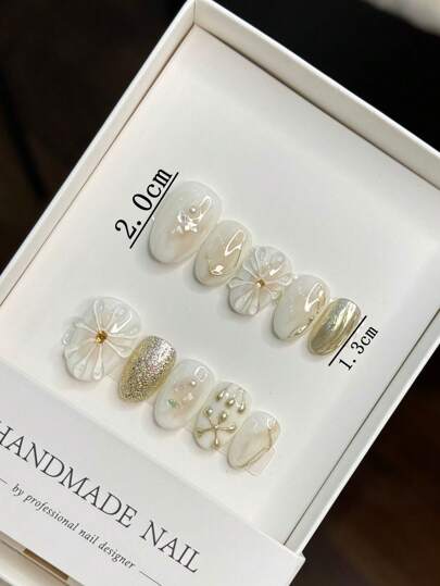 أظافر اصطناعية بطبعة بارزة بيضاوية شكل جديد للربيع، مصنوعة يدويًا، بتصميم وردي ذهبي معدني، لتوفير مواد فن الأظافر للنساء