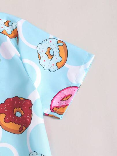 مايوه أولادي مجموعة ملابس سباحة تشمل ملابس علوية بأكمام قصيرة ذات طباعة دونات وشورت للفتى المراهق