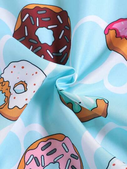 مايوه أولادي مجموعة ملابس سباحة تشمل ملابس علوية بأكمام قصيرة ذات طباعة دونات وشورت للفتى المراهق